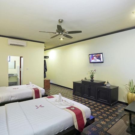 Residence Indochine Suite Sziemreap Szoba fotó