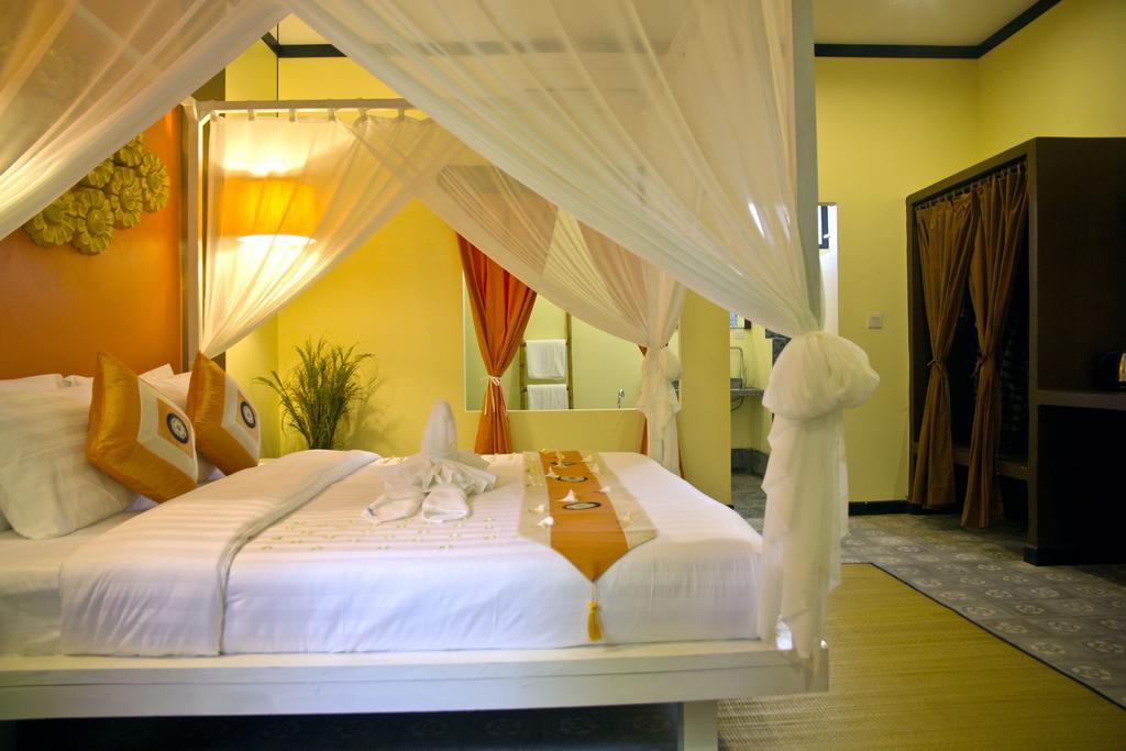 Residence Indochine Suite Sziemreap Szoba fotó