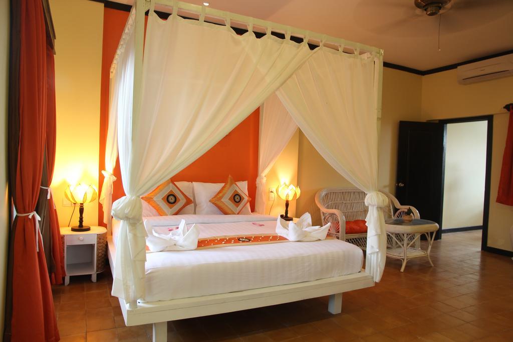 Residence Indochine Suite Sziemreap Szoba fotó
