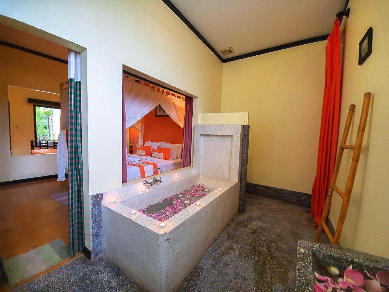 Residence Indochine Suite Sziemreap Szoba fotó
